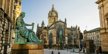 2027 British Isles Golf Cruise Vacation Package The Historic Royal Mile in Edinburgh, Scotland - PerryGolf + Azamara Cruises